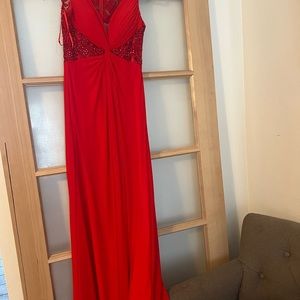 Worn once red gown flattering fit